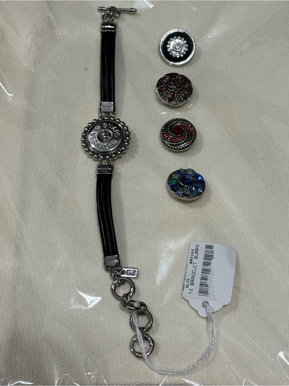 Ginger Snaps Interchangeable Button Bracelet includes 4 different snaps